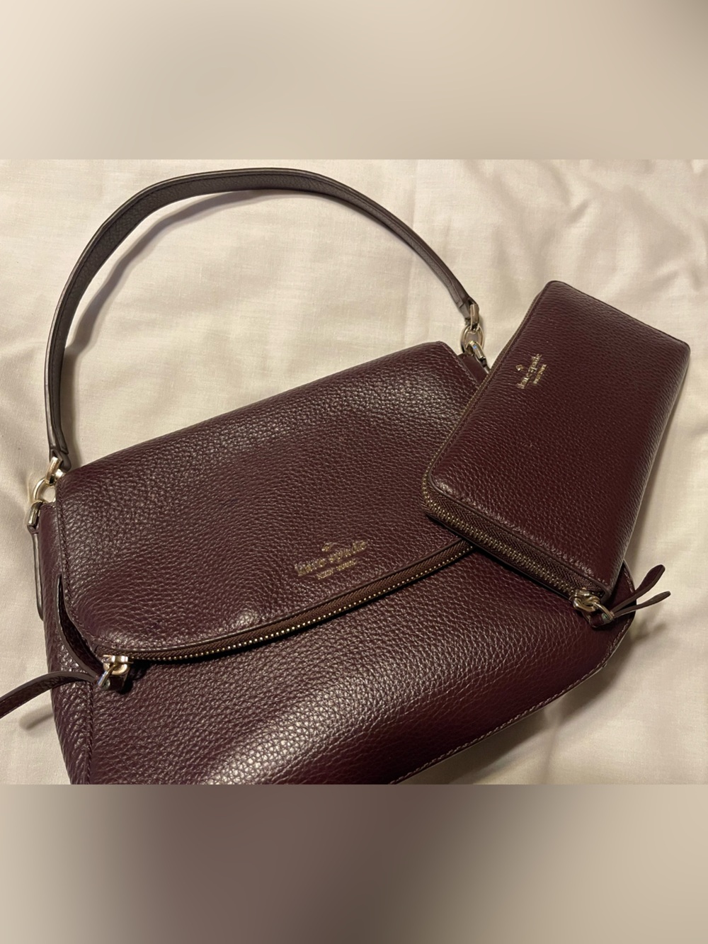 kate spade Pebble Leather Shoulder Bag with matching wallet in Deep Burgundy.
